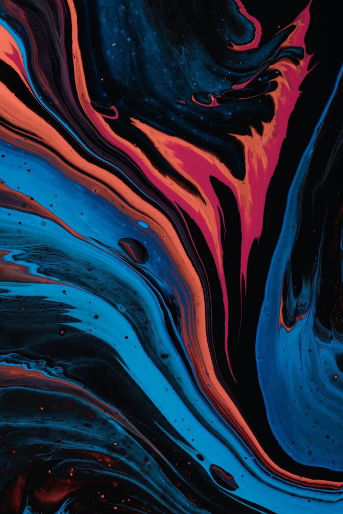 an abstract color swirl of cyan and magenta